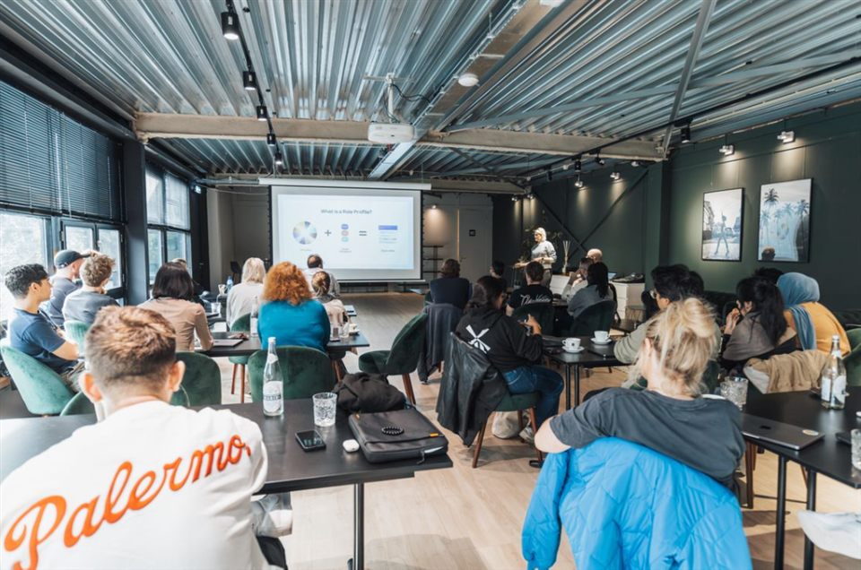 Group training workshop with a projected presentation